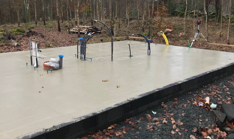 View of the concrete slab with a smooth surface with some rough patches.